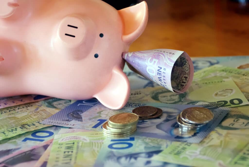 Choosing Wisely: Do I Invest, Save, or opt for KiwiSaver? 1 New Zealand Money (NZD); dollars and coins.