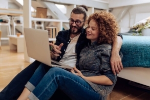 Couple looking at investment options in New Zealand