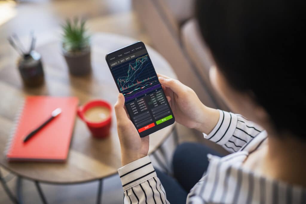 Your Essential Guide: How to Start Investing in New Zealand 5 Investing in cryptocurrency via mobile phone.