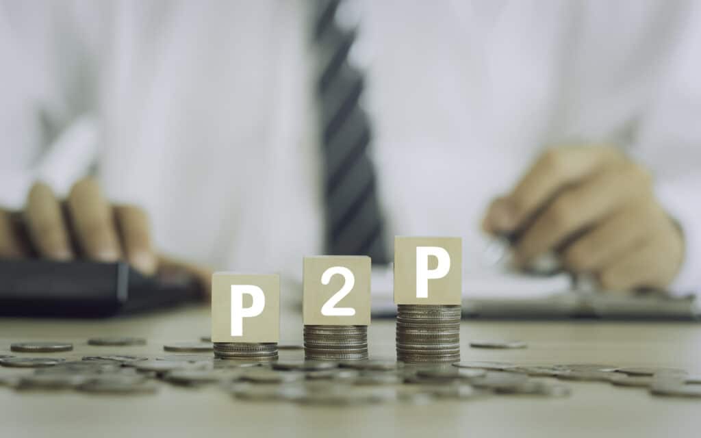 Peer to Peer Lending in NZ - A Guide for Investors 1 Three stacks of coins with the letters P2P across them