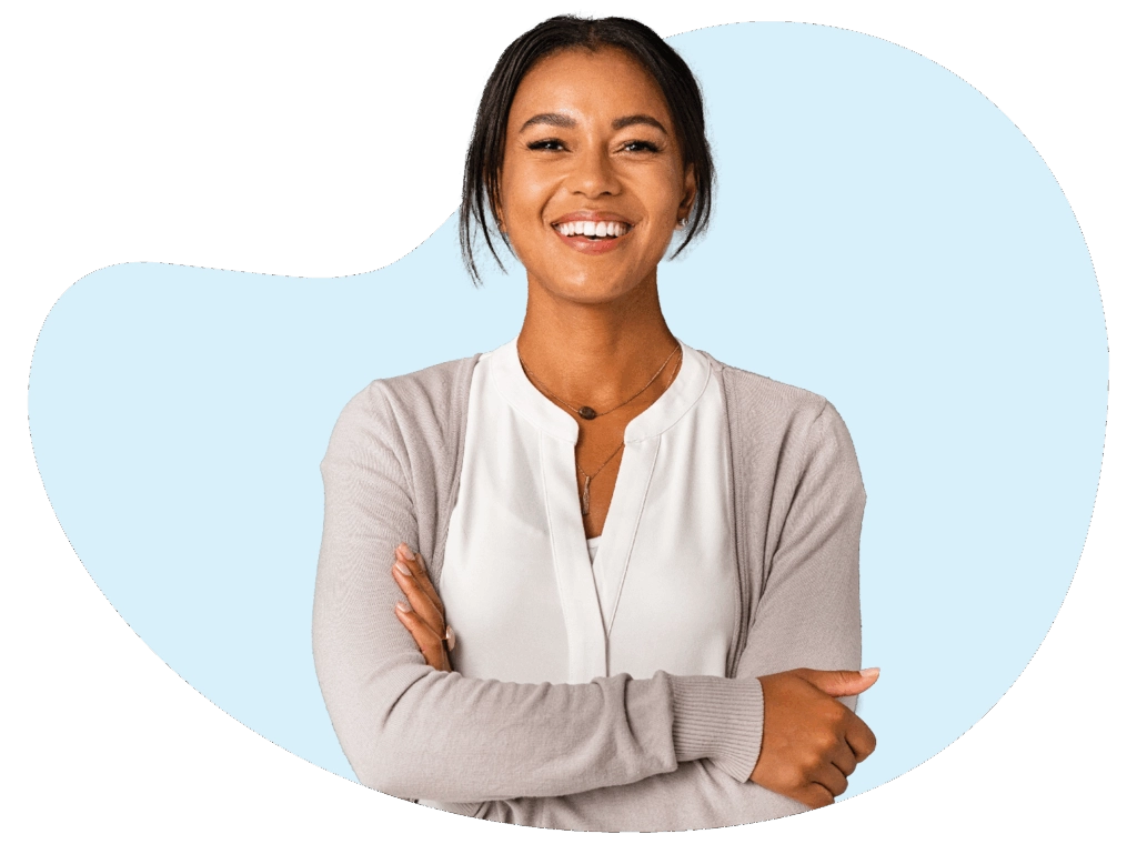 Person with arms crossed, neutral expression.