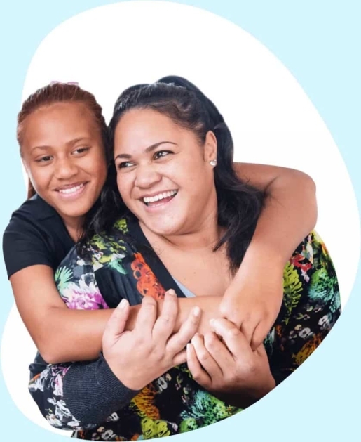 Mother and daughter hugging