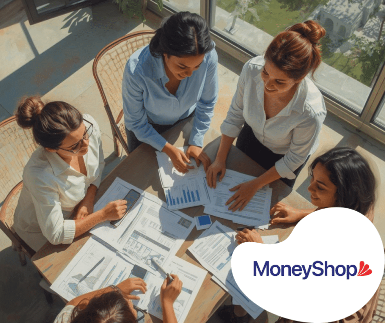 Group collaborating over financial documents.