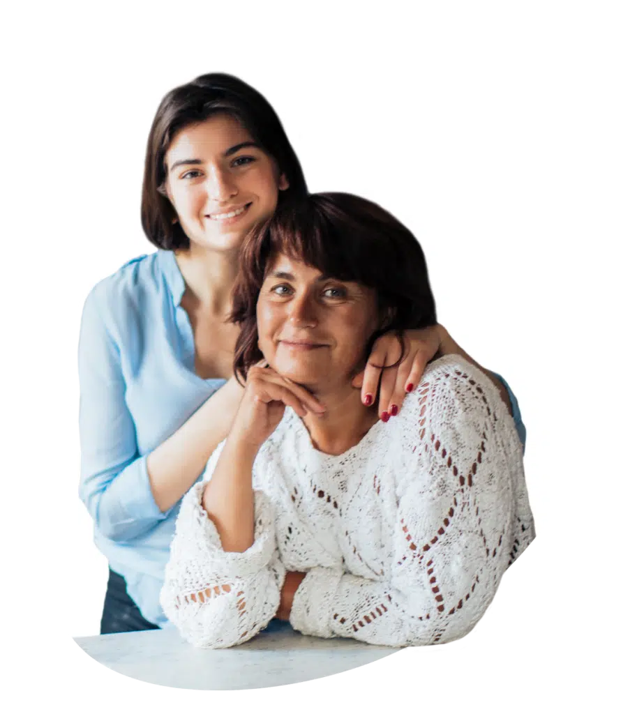 Smiling mother and daughter together.