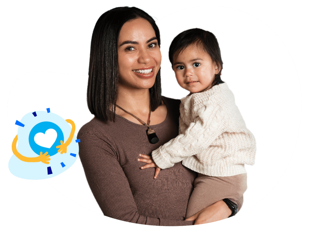 Smiling mother holding her child.
