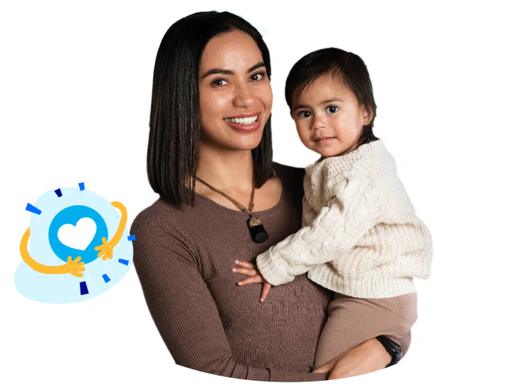 Smiling mother holding her child.